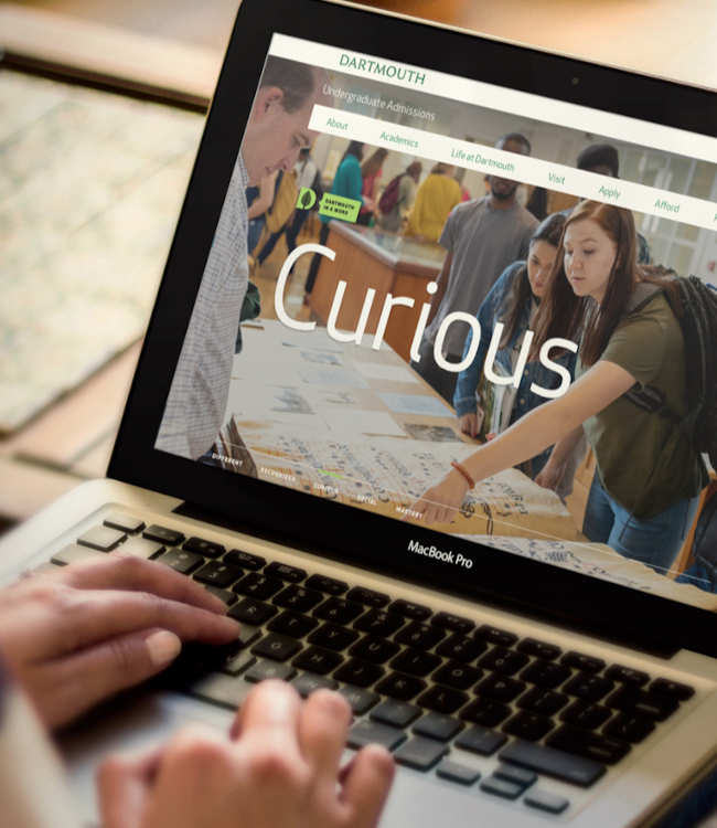 The Dartmouth Admissions homepage displayed on a laptop