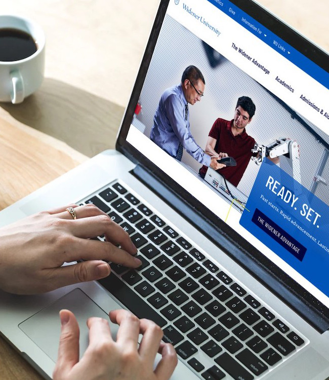 The Widener homepage displayed on a laptop