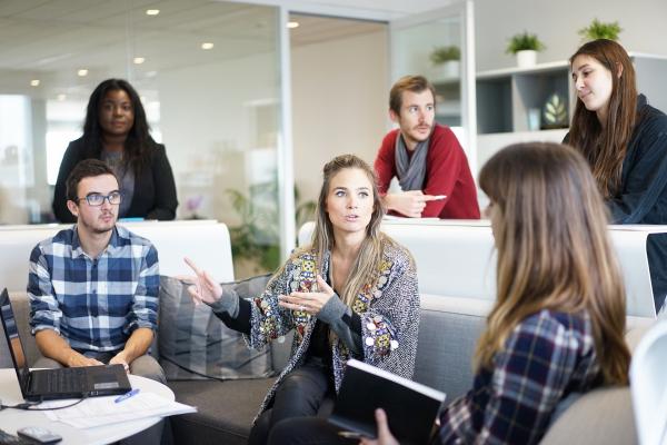 group of people in a meeting having a discussion