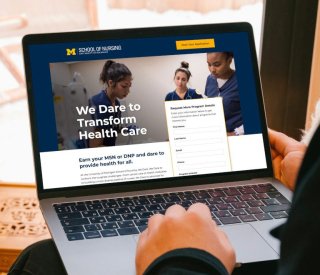 The UMSN website displayed on a laptop