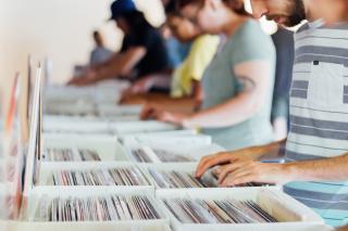 students flipping through records