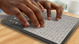 Tablet with Braille on it