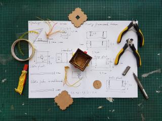 tools sitting on top of a diagram