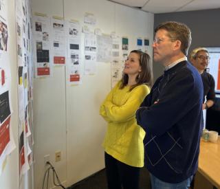 Website_design_process_ed_kara.jpeg Website_design_process_review_2_people_looking_at_designs