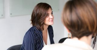 woman listening at meeting