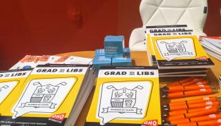 A table full of conference swag
