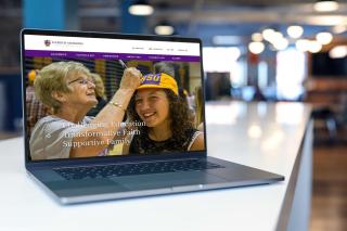 The Hardin-Simmons homepage displayed on a laptop