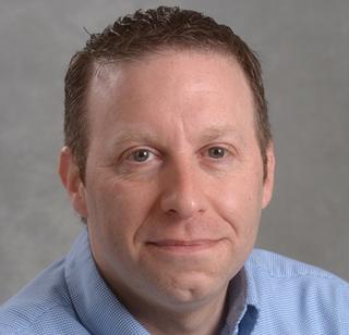 Headshot of Tim Nekritz, Director of News and Media, SUNY Oswego