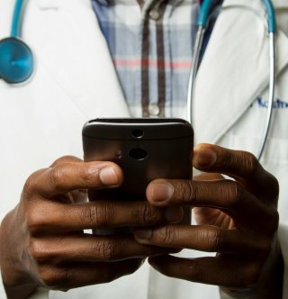 doctor-holding-phone