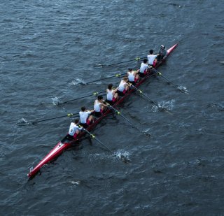 Rowing together in the same direction